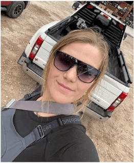 Casual yet professional headshot of a CourTex employee taken at an outdoor court site.